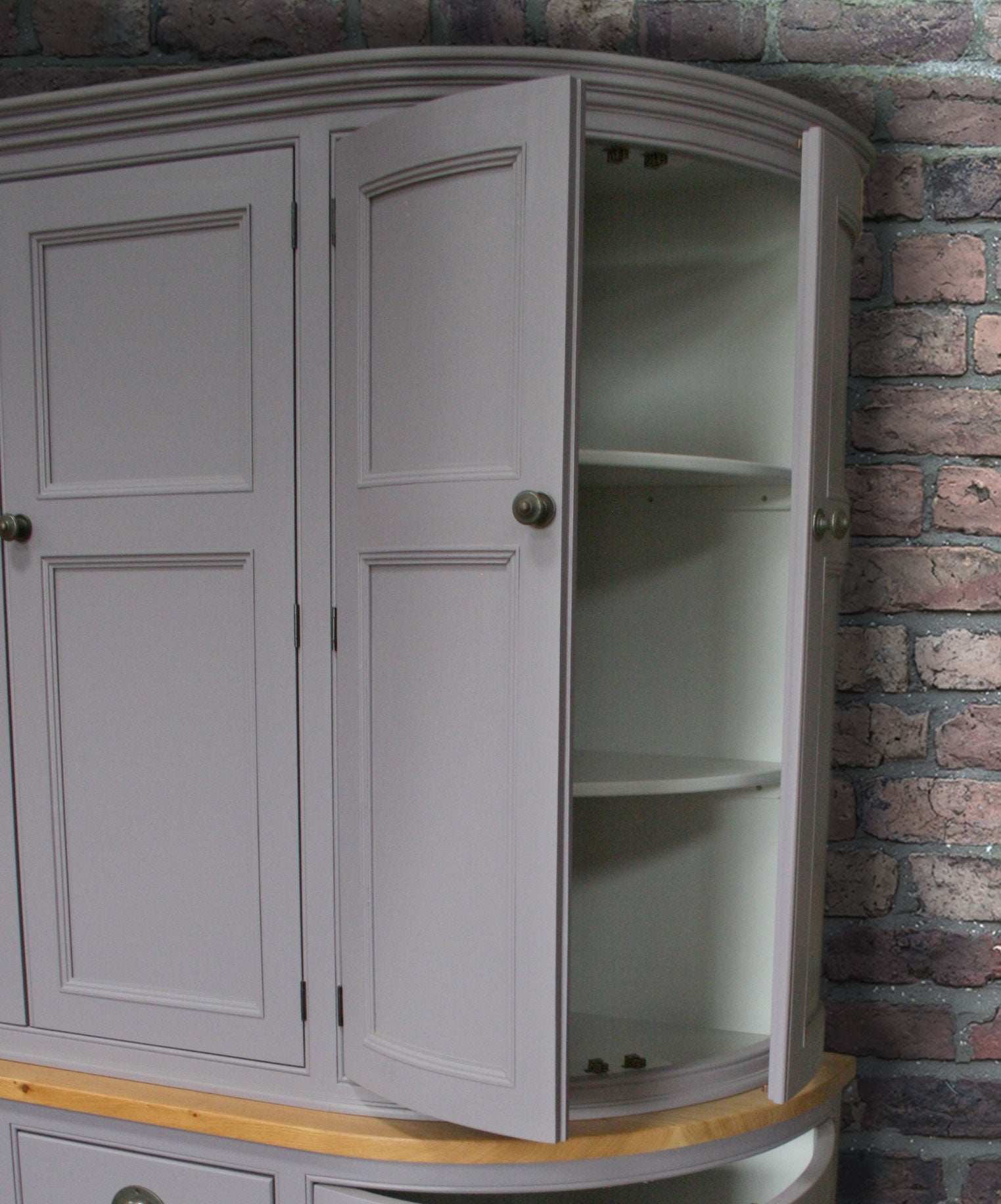 Bow end parlour cupboard